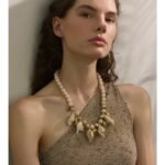 Model with Conch Shell Necklace