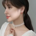 Model with Pomegranate Stud